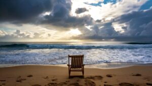 A solitary beach chair facing the ocean under a cloudy sky, peaceful waves rolling in reflecting on the Thought of the Day and the Question of the Day.