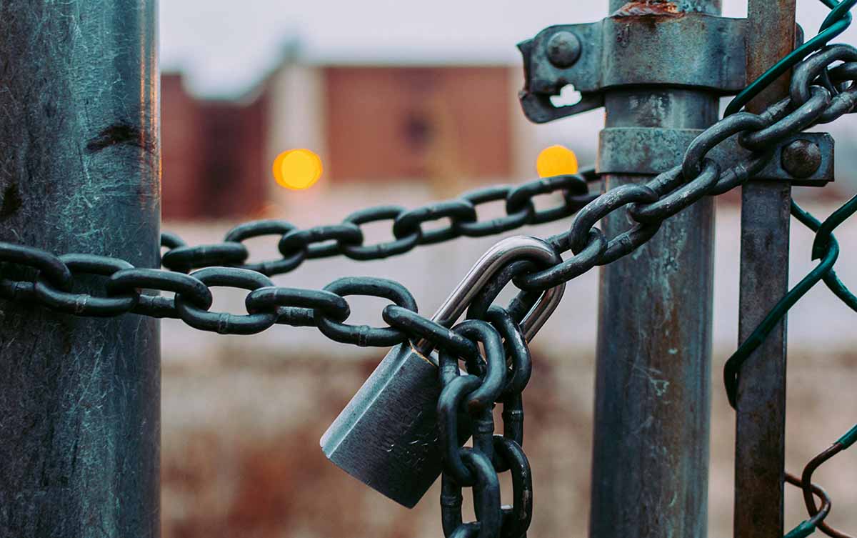 chains - Low Two Pair chains holding a fence closed