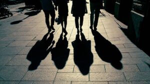 4 people in shadows