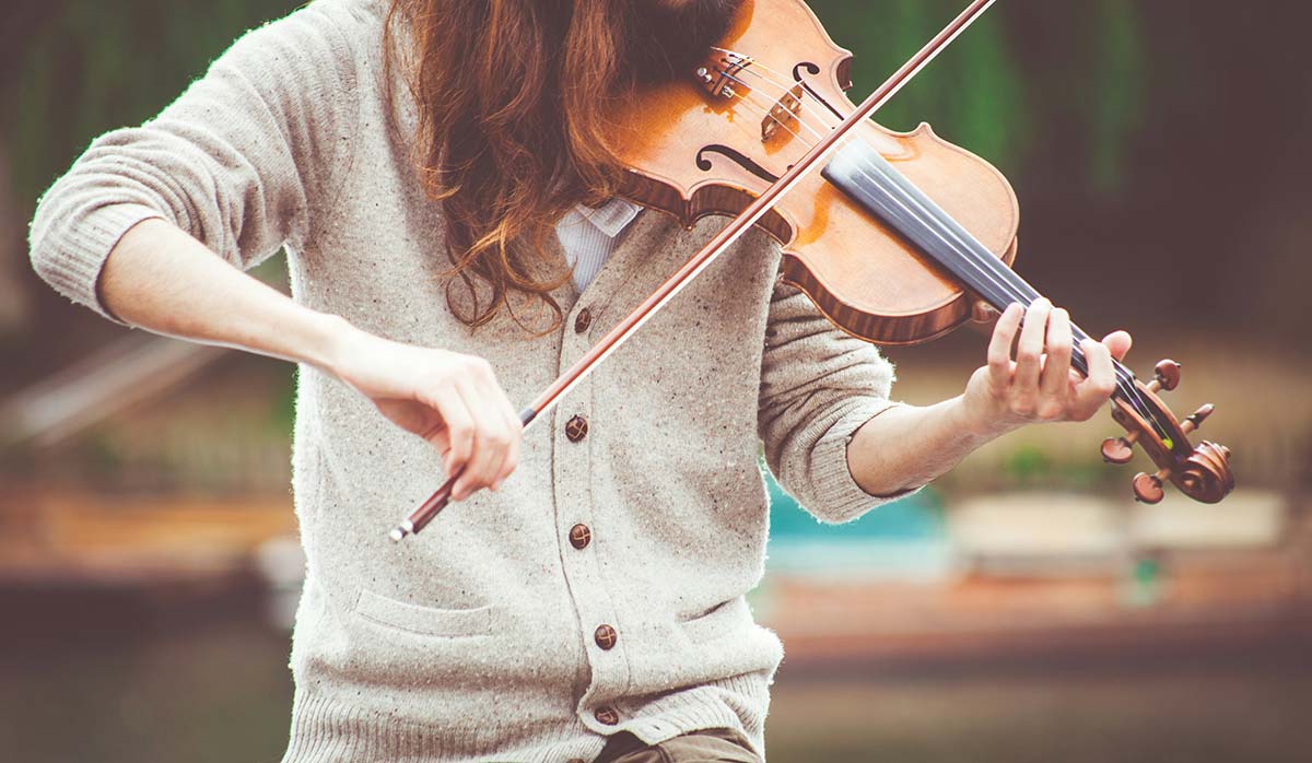 violinist - Low Two Pair a violinist playing in the park