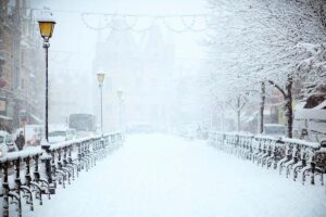a snowy day on a walking bridge
